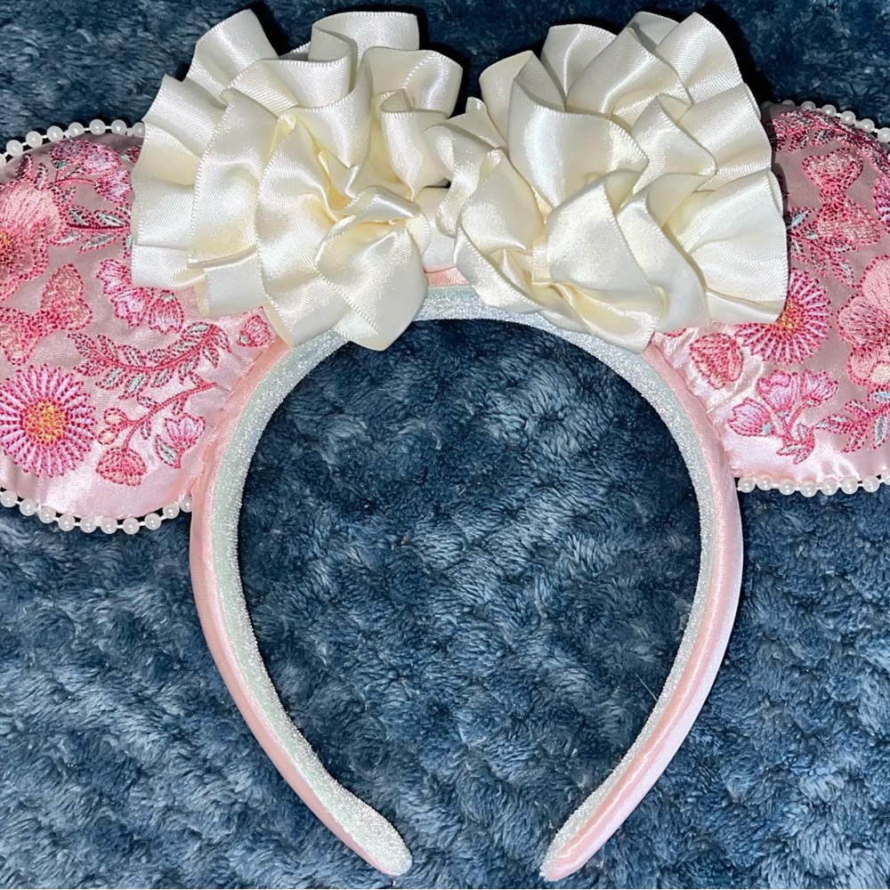 Beautiful pink floral ears with white ruffles